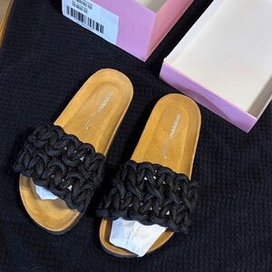 INTENTIONALLY BLANK Black and Tan Slide Sandals